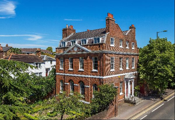 An amazing Georgian townhouse in Reigate, generous accommodation and walled gardens.