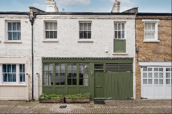 Stunning 3 bedroom house with garage for sale in a highly sought after mews in W2.