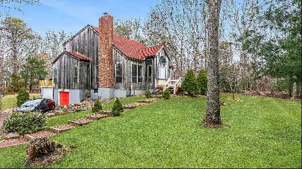 Nestled on just under an acre lot, this enchanting home sits conveniently between the char