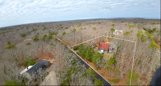 Nestled on just under an acre lot, this enchanting home sits conveniently between the char