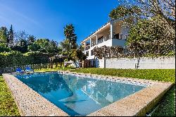 Detached villa with 3 floors and private pool.