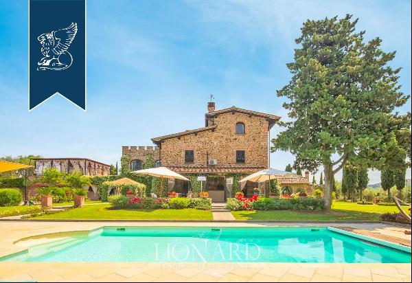 Ancient, finely renovated and enchanting Tuscan farmhouse for sale between Florence and Pr