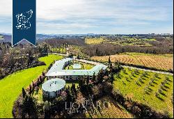 Charming relais with a pool for sale among Tuscan hills