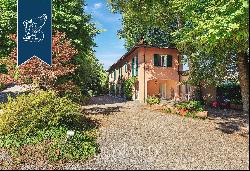 This property for sale a few km from the shores of Lake Como boasts a main villa, an outbu