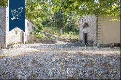 Wonderful stone estate with a private garden for sale on the Appenines in the province of 