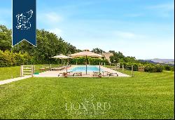 Luxury estate with a farmstead, villa and a cottage for sale in Tuscany, on the Maremma hi