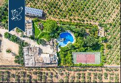 Exclusive relais with a private garden, a pool and a tennis court in the province of Taran