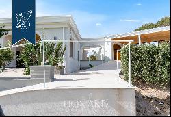 Recently-renovated luxury villa for sale in front the sea in Costa Smeralda