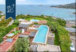 This luxurious panoramic estate boasting a garden and a rooftop with a pool is for sale ju