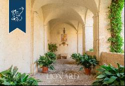 Charming historical villa with panoramic gardens housed in a former Franciscan convent for