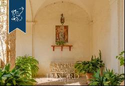 Charming historical villa with panoramic gardens housed in a former Franciscan convent for
