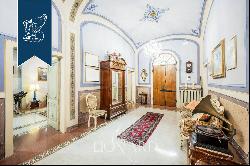 Luxury villa adorned with fine Art-Nouveau finishes and original frescoes for sale in Tusc