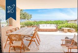 Typical stone villa with a stunning pool for sale in Porto Cervo, surrounded by nature amo