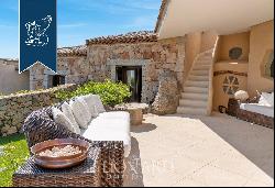 Typical stone villa with a stunning pool for sale in Porto Cervo, surrounded by nature amo