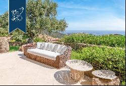 Typical stone villa with a stunning pool for sale in Porto Cervo, surrounded by nature amo