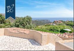 Typical stone villa with a stunning pool for sale in Porto Cervo, surrounded by nature amo