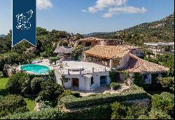 Charming villa with big panoramic terraces for sale on the highest point of Porto Cervo's 