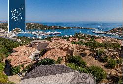Charming villa with big panoramic terraces for sale on the highest point of Porto Cervo's 