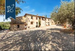 17th-century hamlet converted into a relais with a pool for sale in Umbria