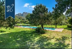 Villa with a pool and a big planted park for sale in the leafy Costa Smeralda
