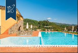 Luxury resort with pool and golf court for sale in Tuscany's Lunigiana area