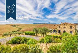 Charming Tuscan farmstead with a stone pool for sale in the heart of Val d'Orcia