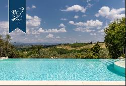 Ancient hamlet with a pool and 67 hectares of grounds for sale on San Gimignano's leafy hi