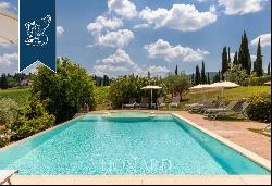 Ancient hamlet with a pool and 67 hectares of grounds for sale on San Gimignano's leafy hi