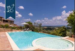 Ancient hamlet with a pool and 67 hectares of grounds for sale on San Gimignano's leafy hi