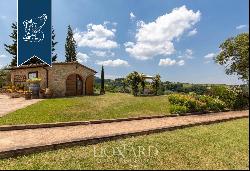 Ancient hamlet with a pool and 67 hectares of grounds for sale on San Gimignano's leafy hi