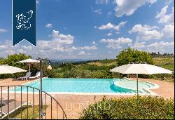 Ancient hamlet with a pool and 67 hectares of grounds for sale on San Gimignano's leafy hi