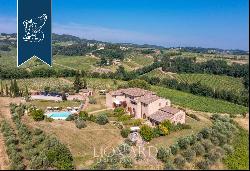 Ancient hamlet with a pool and 67 hectares of grounds for sale on San Gimignano's leafy hi