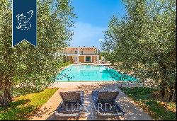 Charming resort with a pool and wellness area in Arezzo