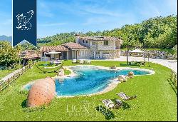 Luxury estate for sale with a big park, pool with a sauna, indoor spa with a gym