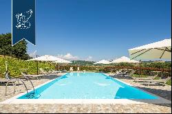 Agritourism resort with a park and a lit pool for sale near San Benedetto del Tronto