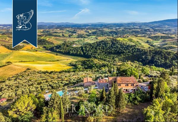 Refined agritourism resort with an infinity pool for sale in Certaldo