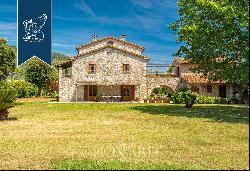 Typical tuscan villa with a garden and a small lake for sale in Pietrasanta, Versilia