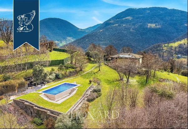 Luxury and designer estate with a spectacular view of the hills of the province of Bergamo