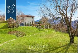 Luxury and designer estate with a spectacular view of the hills of the province of Bergamo