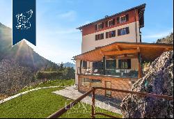 Exclusive panoramic hotel with big park and exclusive view of the Orobian Alps for sale a 