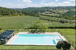 Exquisite renovation of this period farmhouse on the unspoiled hills of Todi