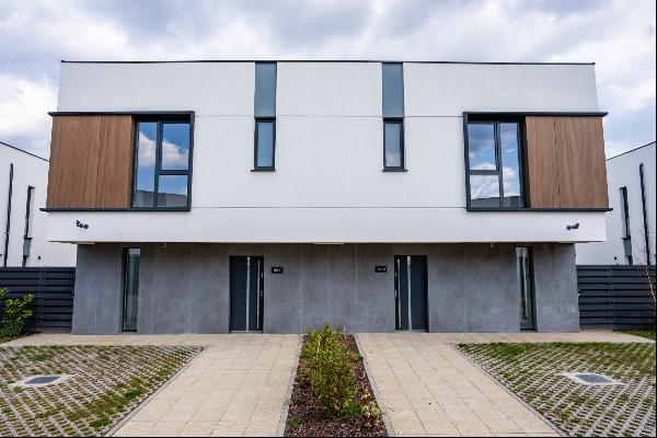 In the heart of a serene rural landscape lay - minimalist semi-detached villas