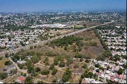 Land on the road to Colima, Nuevo Milenio.