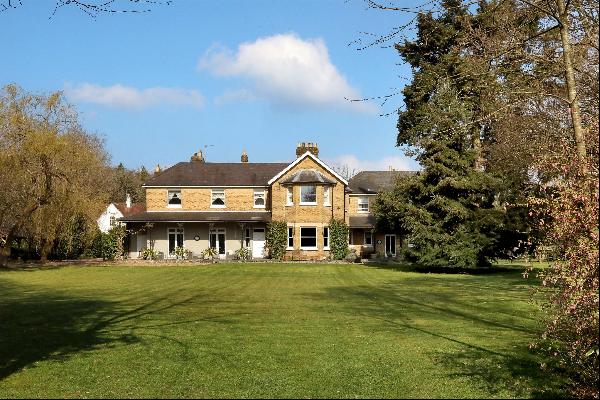 A handsome Victorian country house with a wonderful annexe, set within delightful gardens 