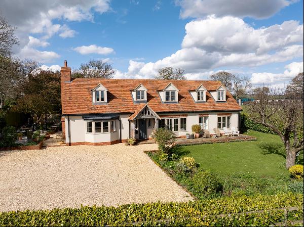An immaculate, contemporary house with far reaching views, on the edge of a highly desirab