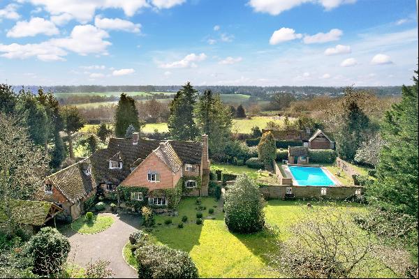 A lovely family home, in wonderful gardens and grounds, in this popular Chiltern's village