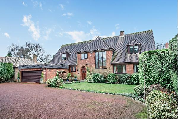 A superb 5 bedroom family home with extensive, flowing accommodation with beautiful landsc