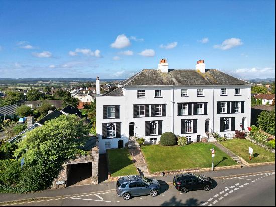 A beautifully presented Grade II listed Georgian town house in Topsham with walled garden,