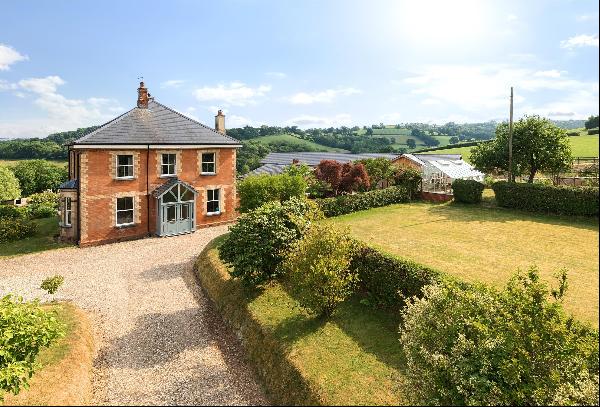 A gorgeous Victorian home set in just under 4 acres offering exceptional views and several