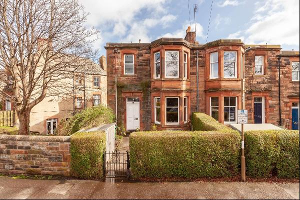 Rarely available end of terrace family home in Morningside, with front and rear garden.